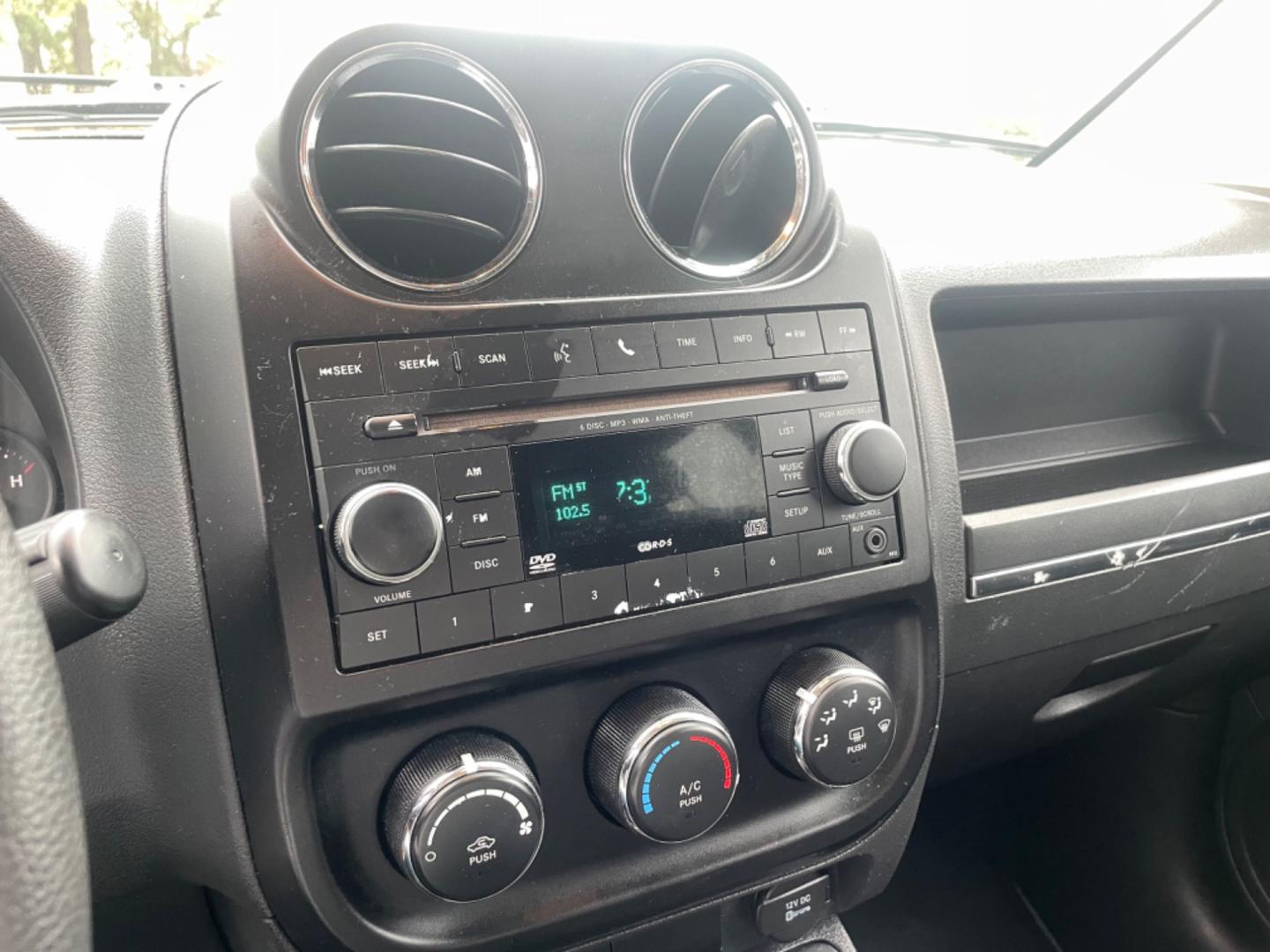 2012 SILVER JEEP COMPASS SPORT (1C4NJCBA8CD) with an 2.0L engine, Continuously Variable transmission, located at 5103 Dorchester Rd., Charleston, SC, 29418-5607, (843) 767-1122, 36.245171, -115.228050 - Spacious Interior with CD/AUX/AM/FM, Hands-free Phone, Power Windows, Power Locks, Power Windows, Power Mirrors, Keyless Entry, Alloy Wheels. Local Trade-in!! 108k miles Located at New Life Auto Sales! 2023 WINNER for Post & Courier's Charleston's Choice Pre-owned Car Dealer AND 2018-2024 Top 5 Fin - Photo#16